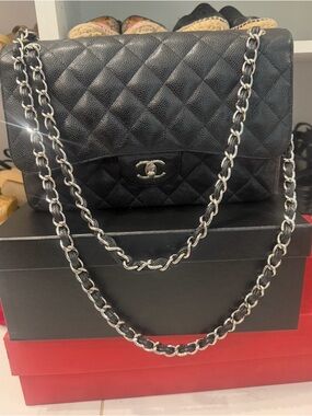 CHANEL Black Quilted Leather Shoulder Bag with Silver Chain